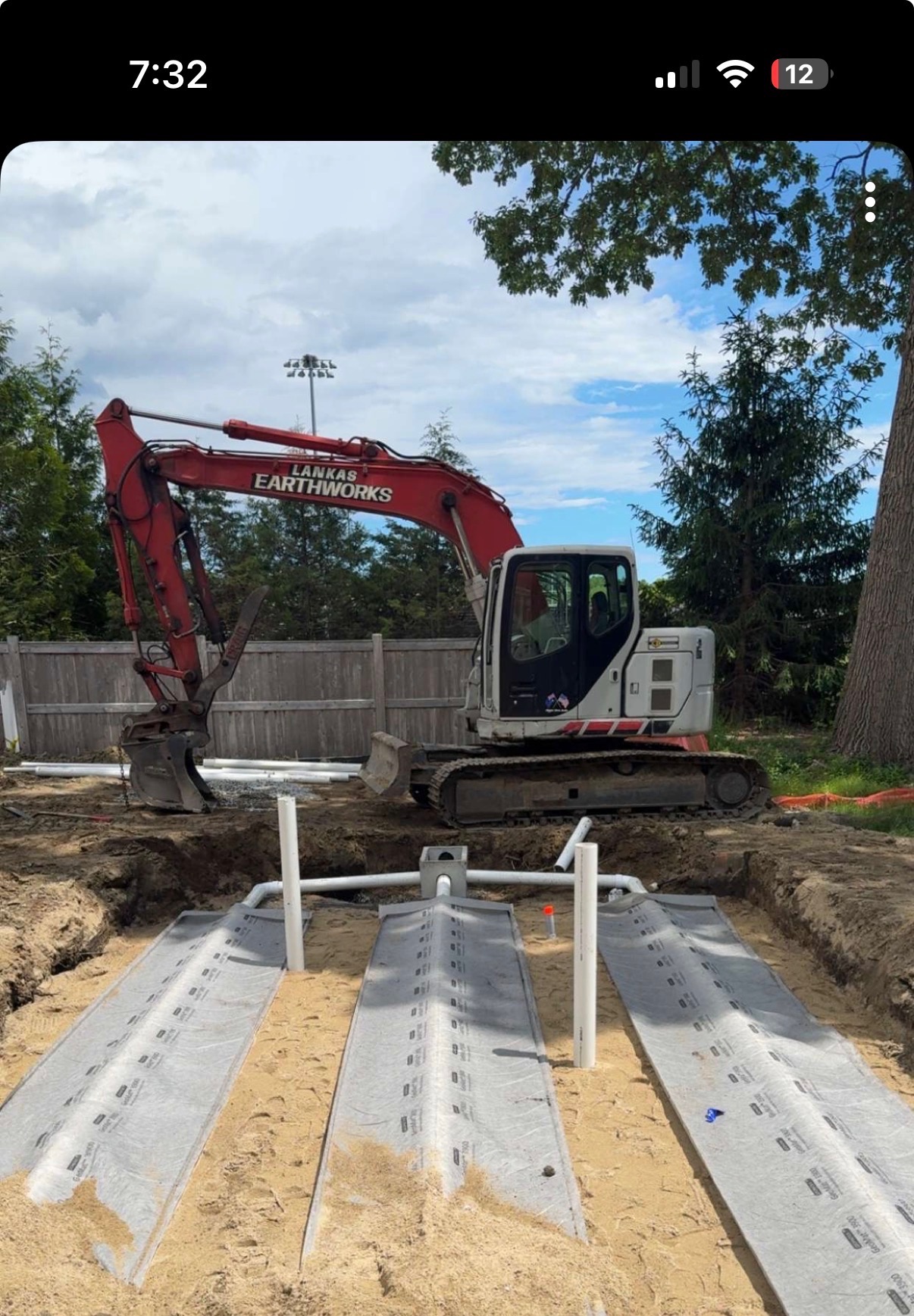 Lankas Earthworks excavator beside an installed septic system